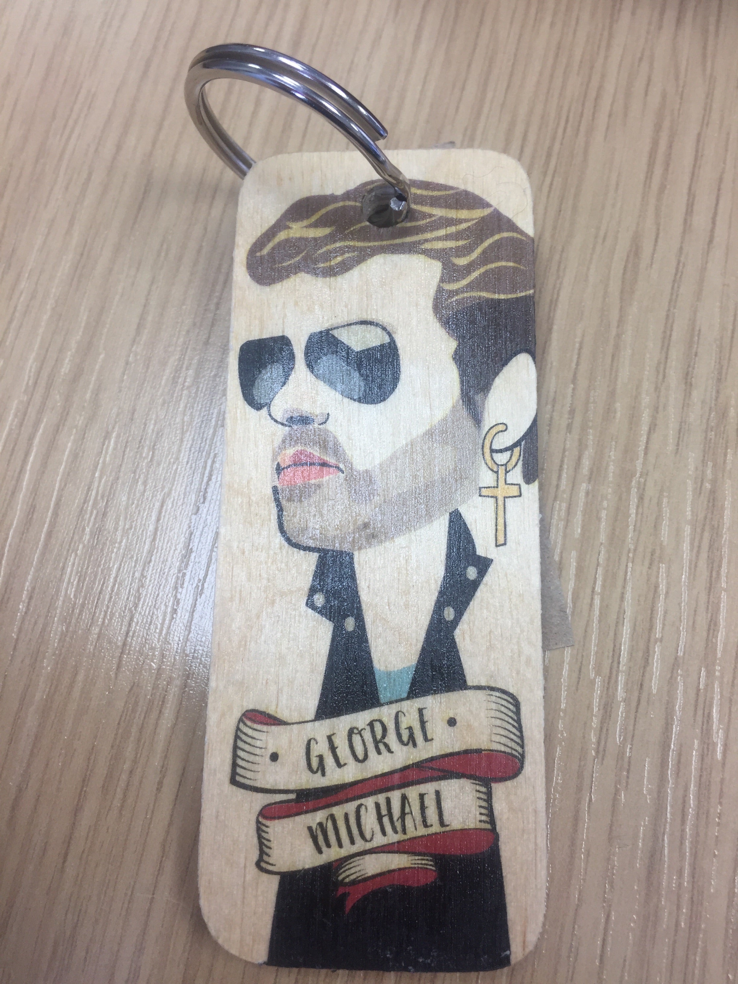 Handmade chunky wooden keyring with natural wood finish and Sable Homeware branding, showcasing its sturdy, stylish design.