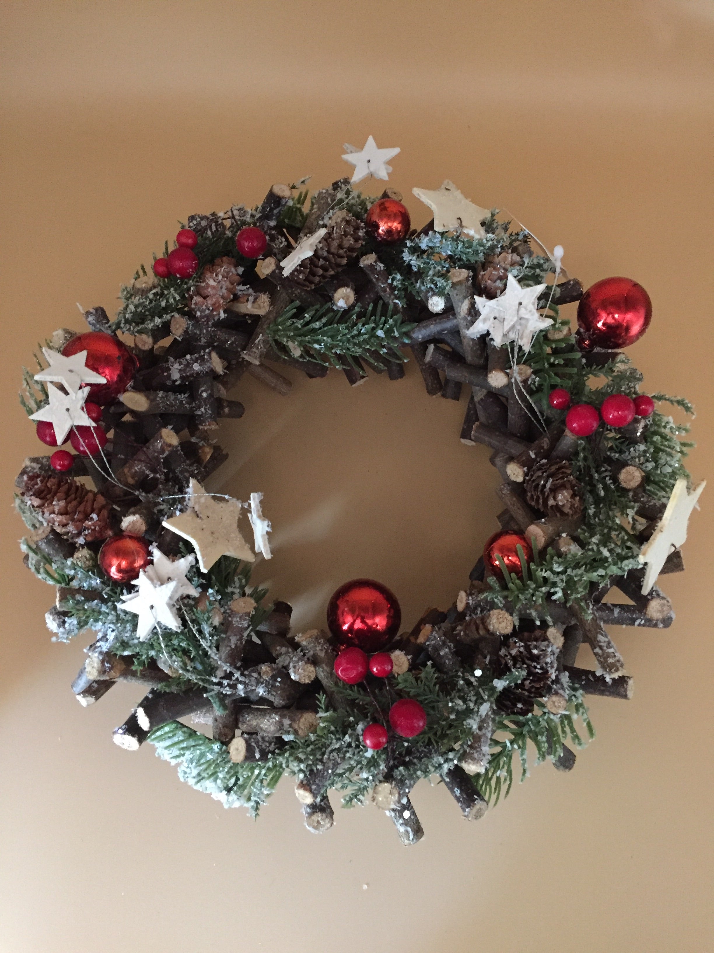 Large red and woodland white stars round Christmas wreath by Shabbyquins, featuring festive holiday decoration with star accents.