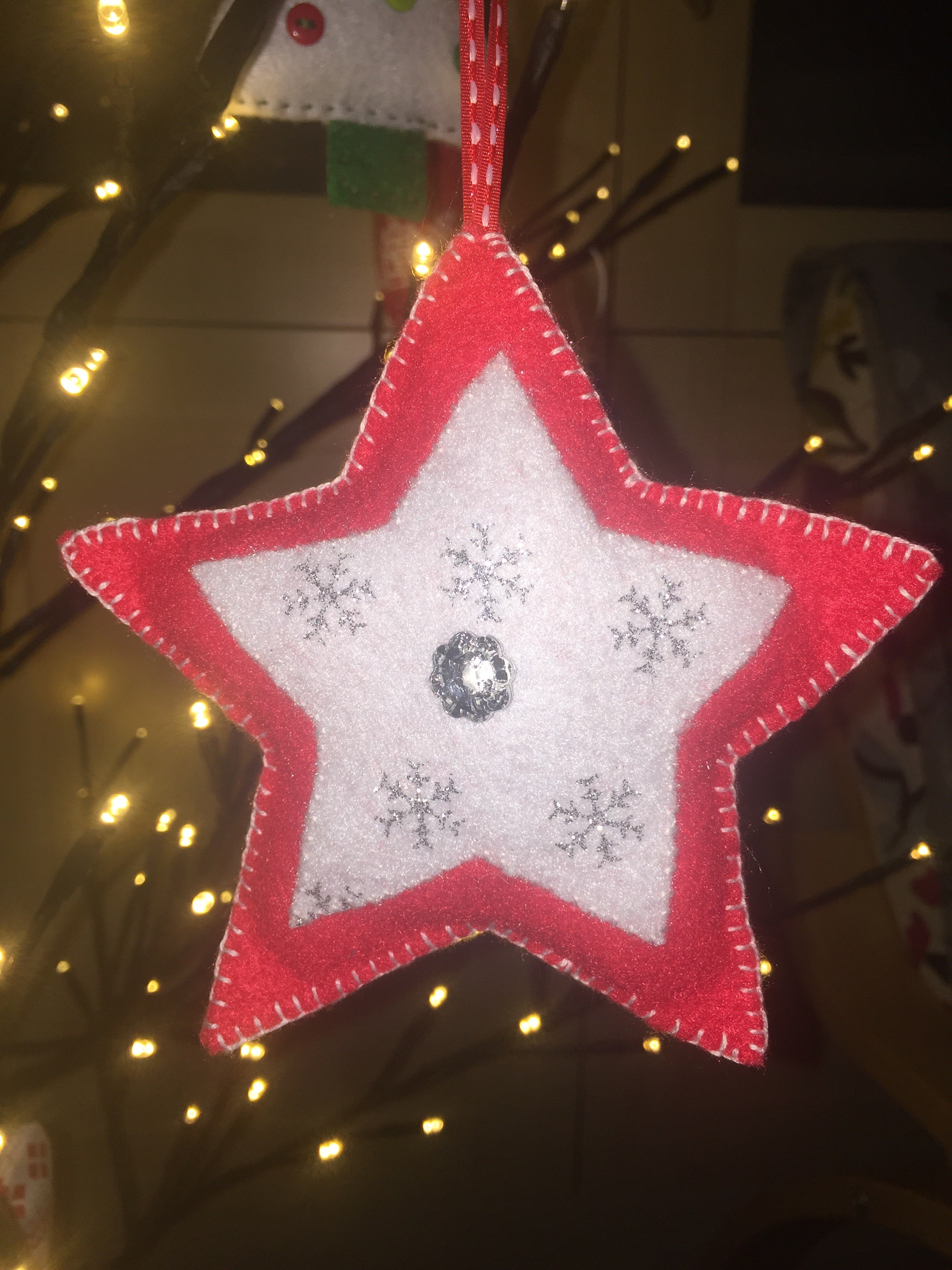Handmade Christmas tree ornaments from Sable Homeware featuring festive designs and intricate detailing for holiday decor.