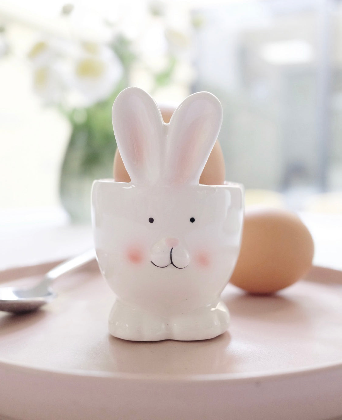 White Bunny ceramic egg cup from Sable Homeware, featuring a cute bunny shape and smooth ceramic finish.