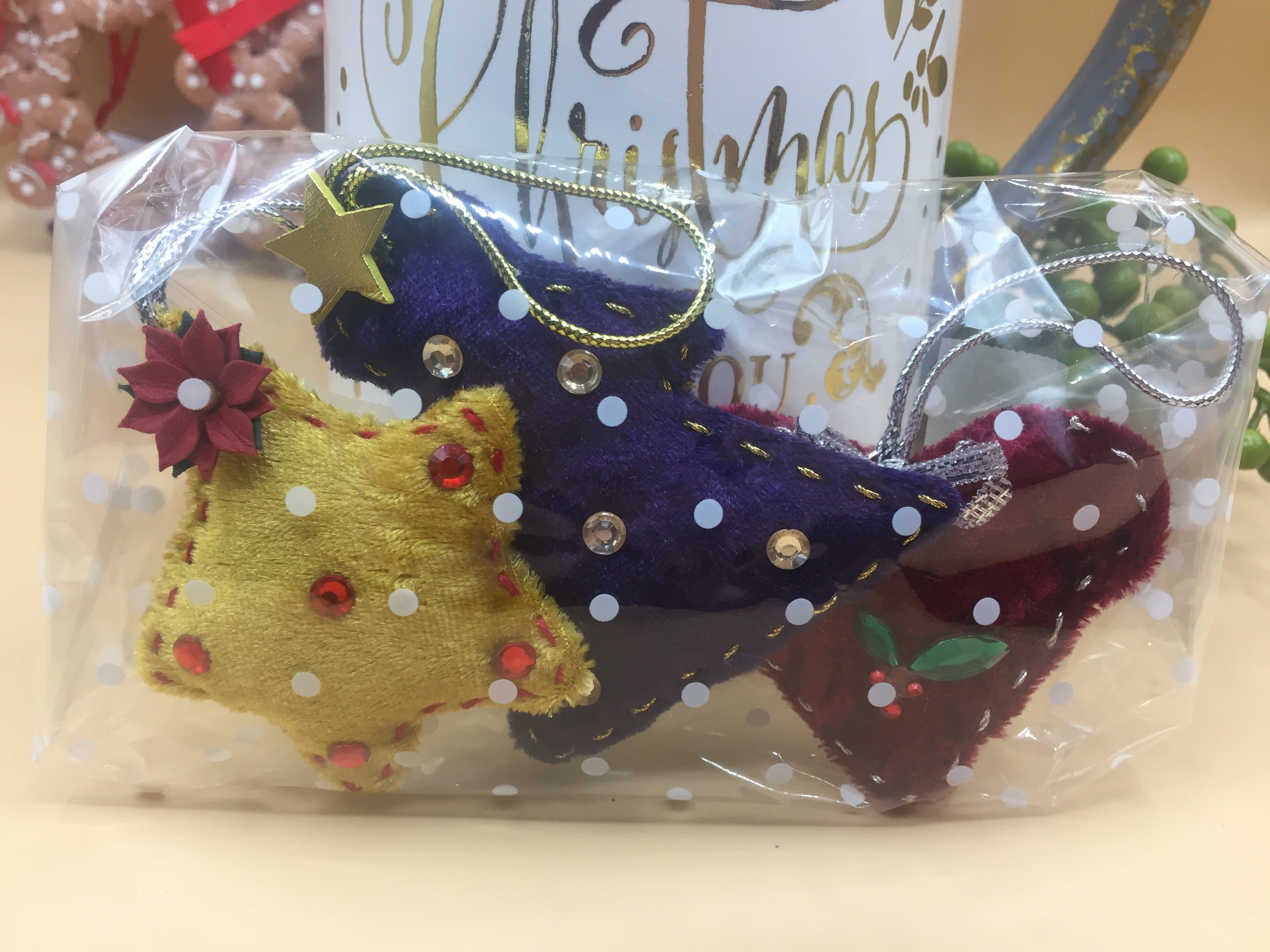 Handmade Sable Homeware Christmas Tree Ornaments with festive designs, perfect for decorating a holiday tree.
