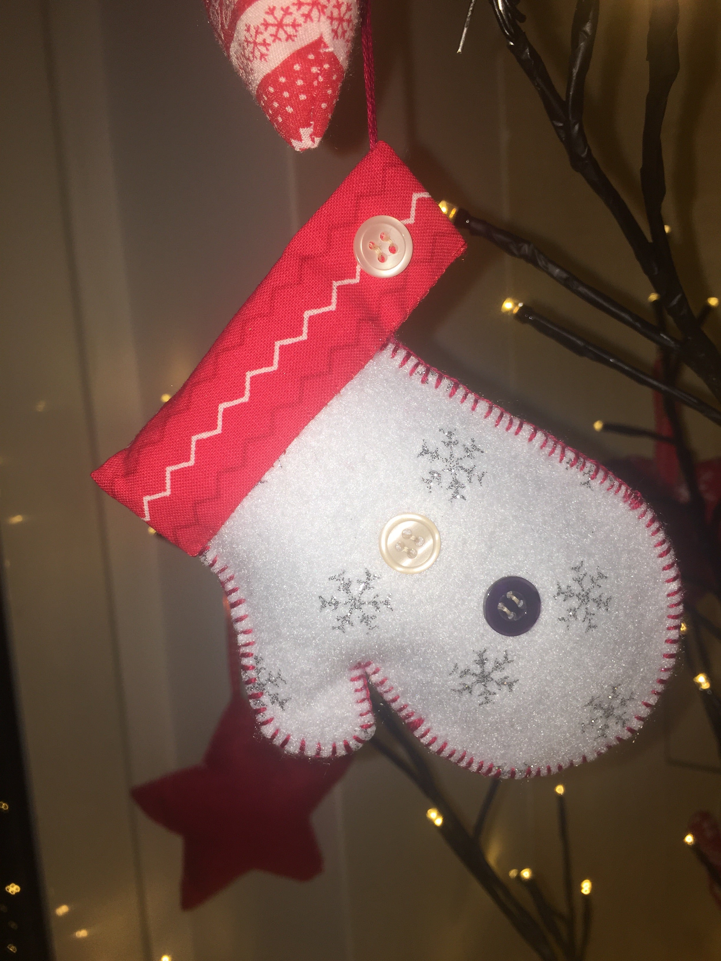 Handmade Christmas Tree Ornaments by Sable Homeware, festive decorated tree with colorful handcrafted decorations, holiday season decor