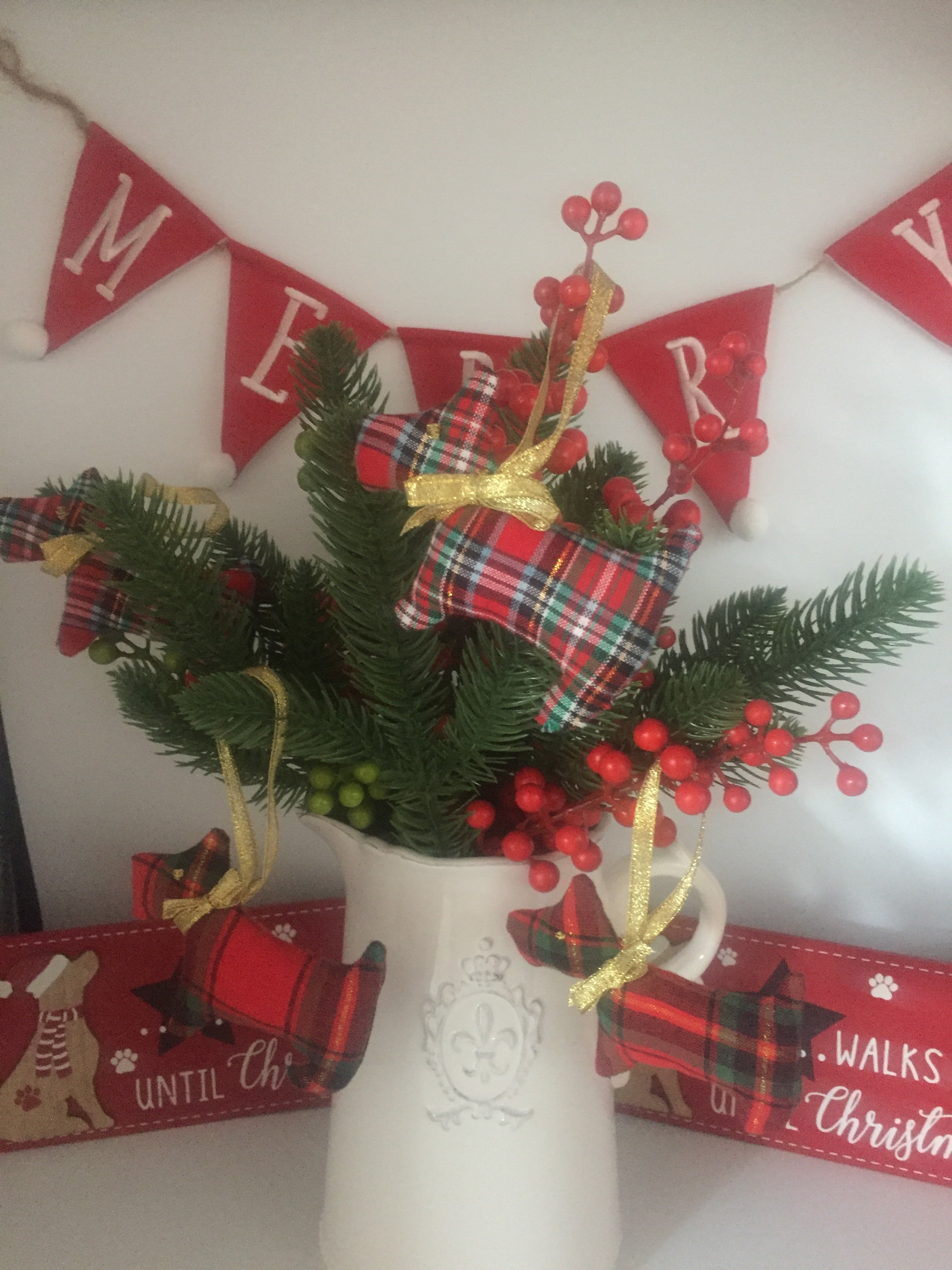 Handmade Christmas tree ornaments by Sable Homeware, colorful and festive holiday decorations hanging on a Christmas tree.