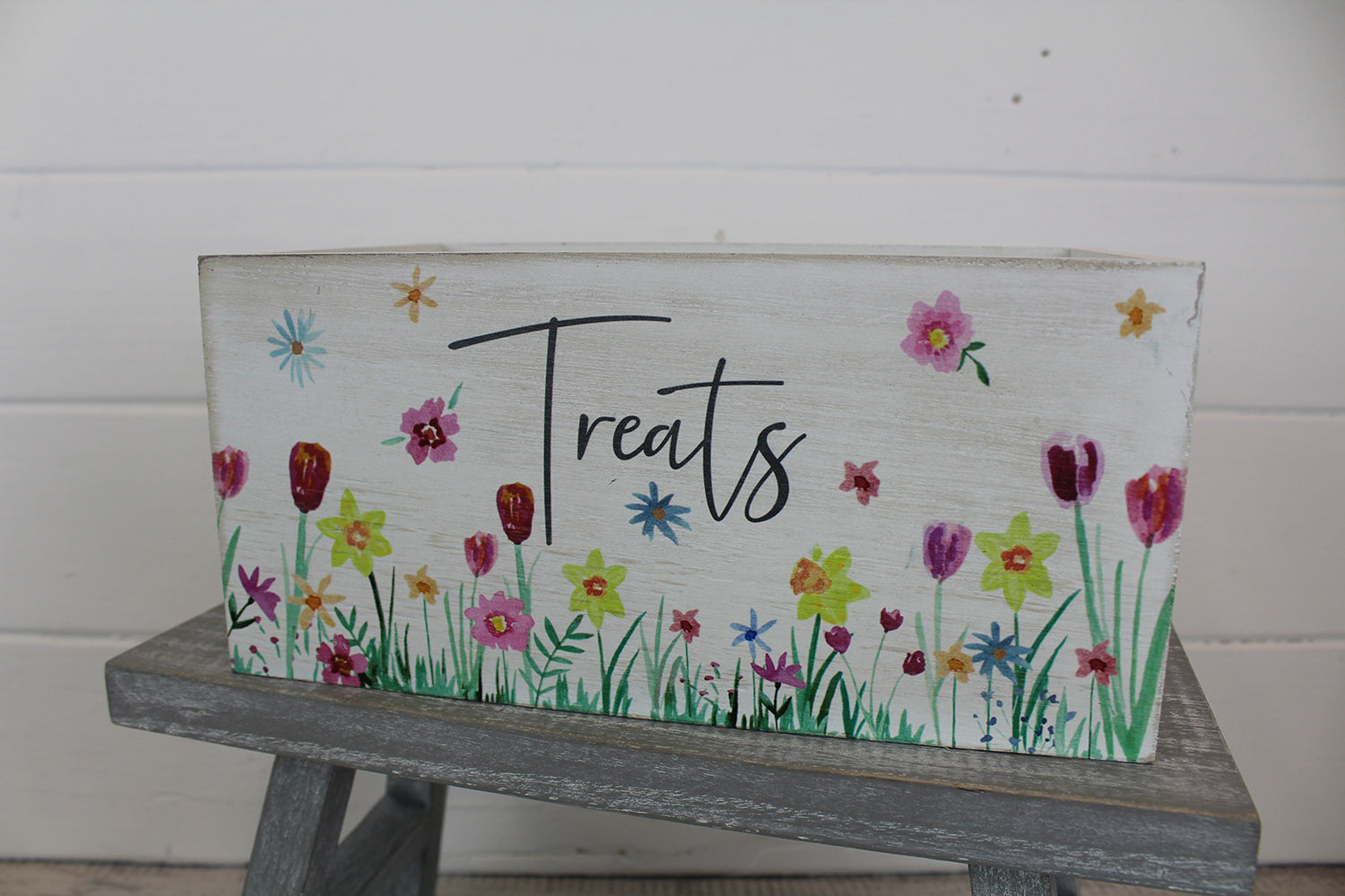 Spring floral wooden crate used as a decorative trinket dish with a rustic shabby chic design.