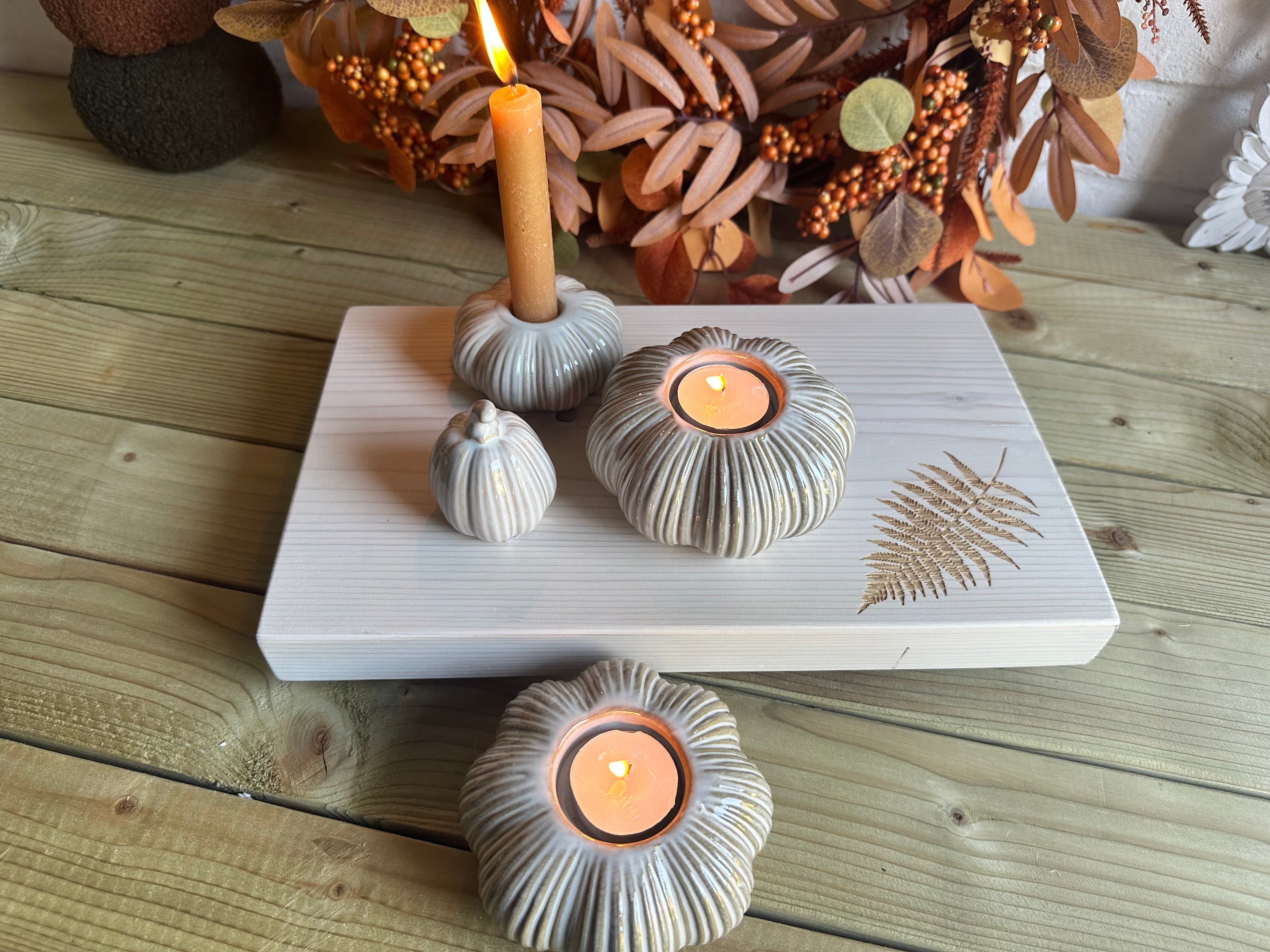White pumpkin candle holder by Sable Homeware, decorative ceramic or resin design, perfect for autumn or Halloween decor.