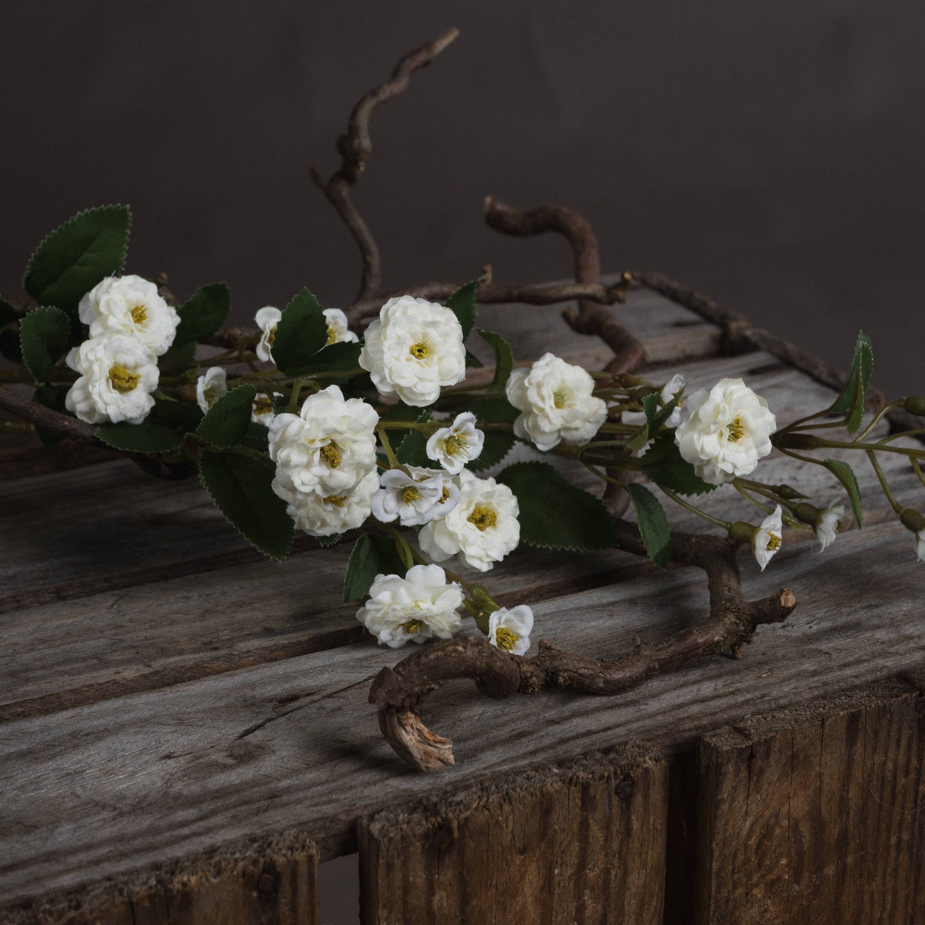 White Wild Meadow Rose faux flower branch with delicate rose blossoms, ideal for home decor by Sable Homeware.