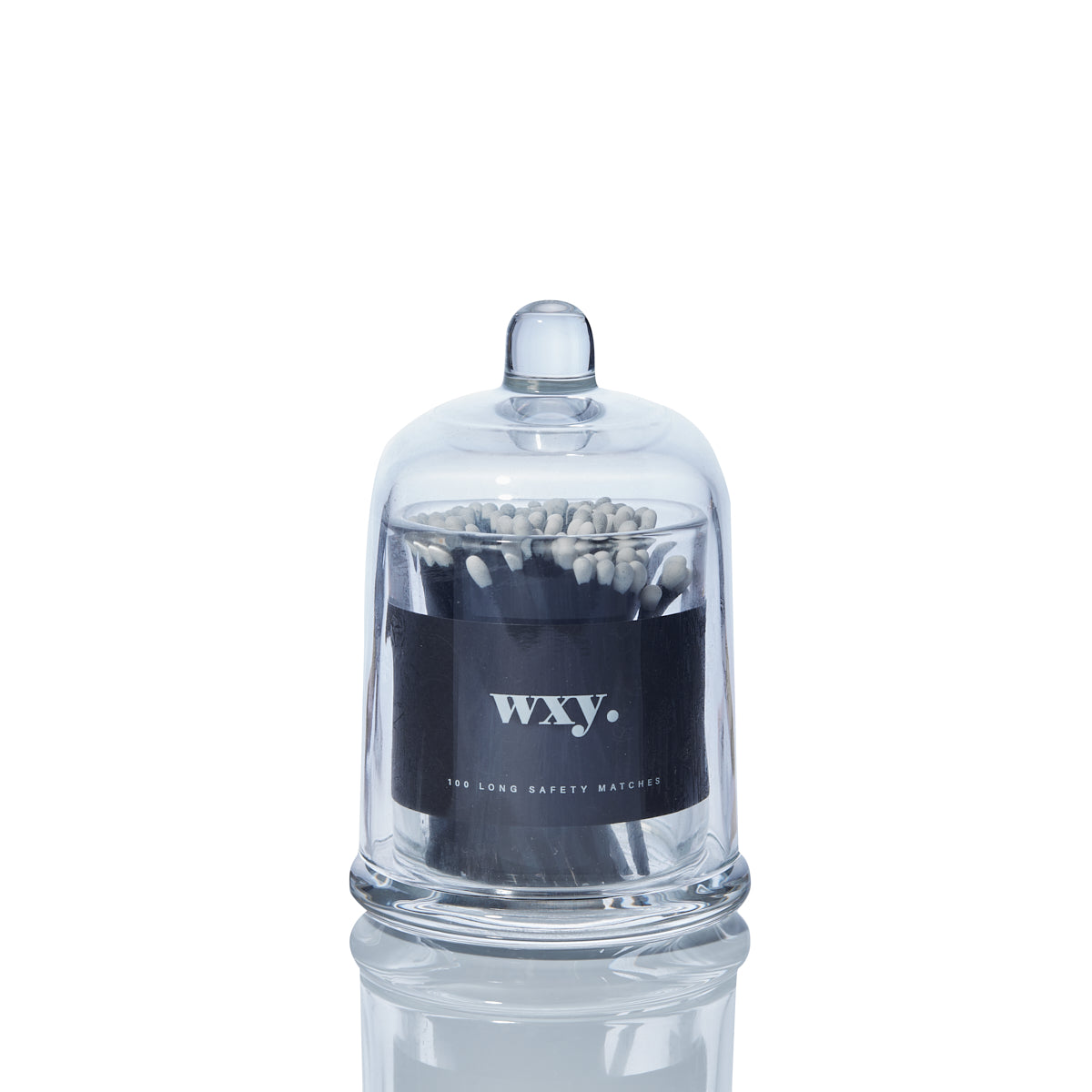 Sable Homeware deluxe matches inside a glass cloche, displayed on a wooden surface with a stylish, modern design.