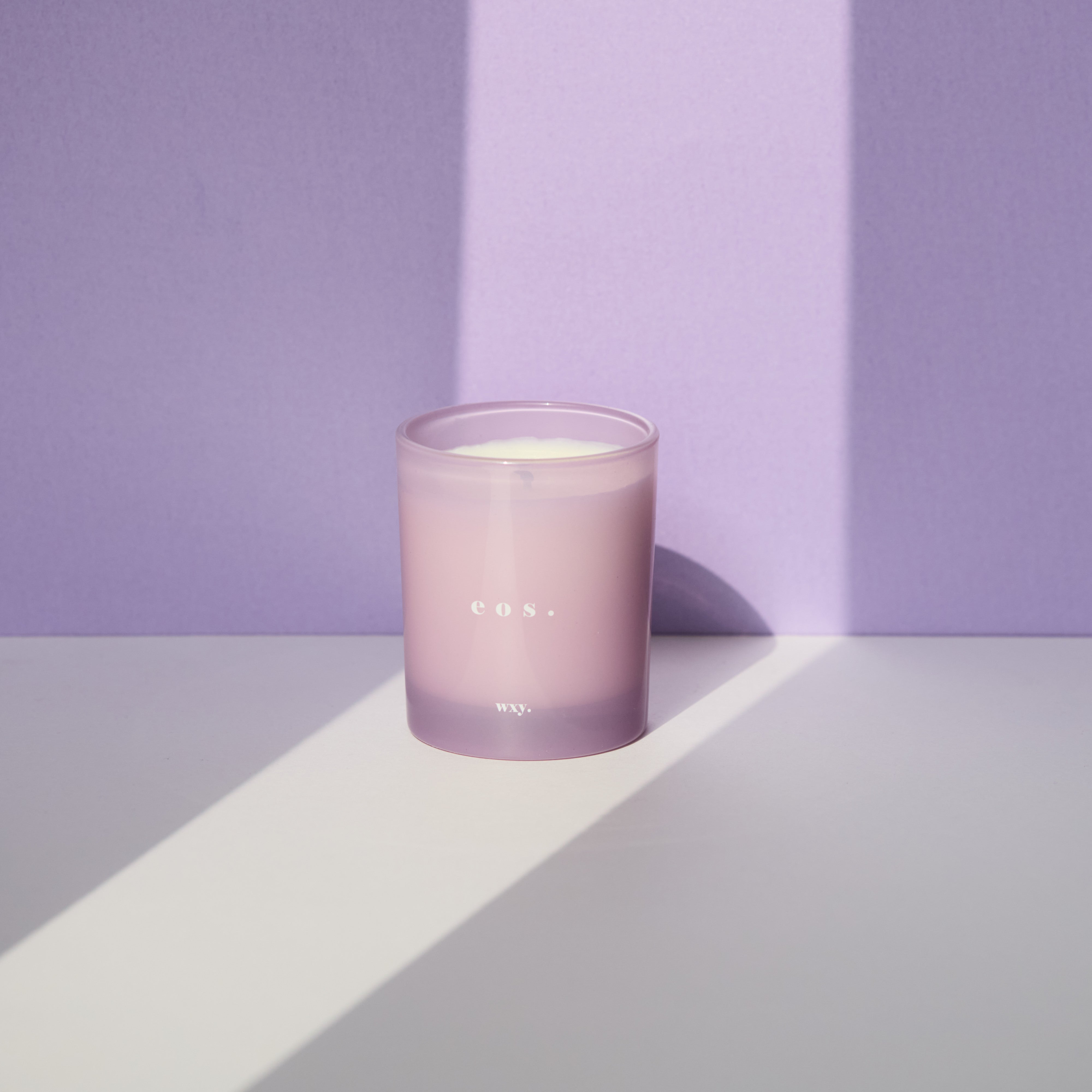 Sable Homeware Eos Orris Root & Amber Deluxe Candle with elegant glass holder and warm, inviting fragrance.
