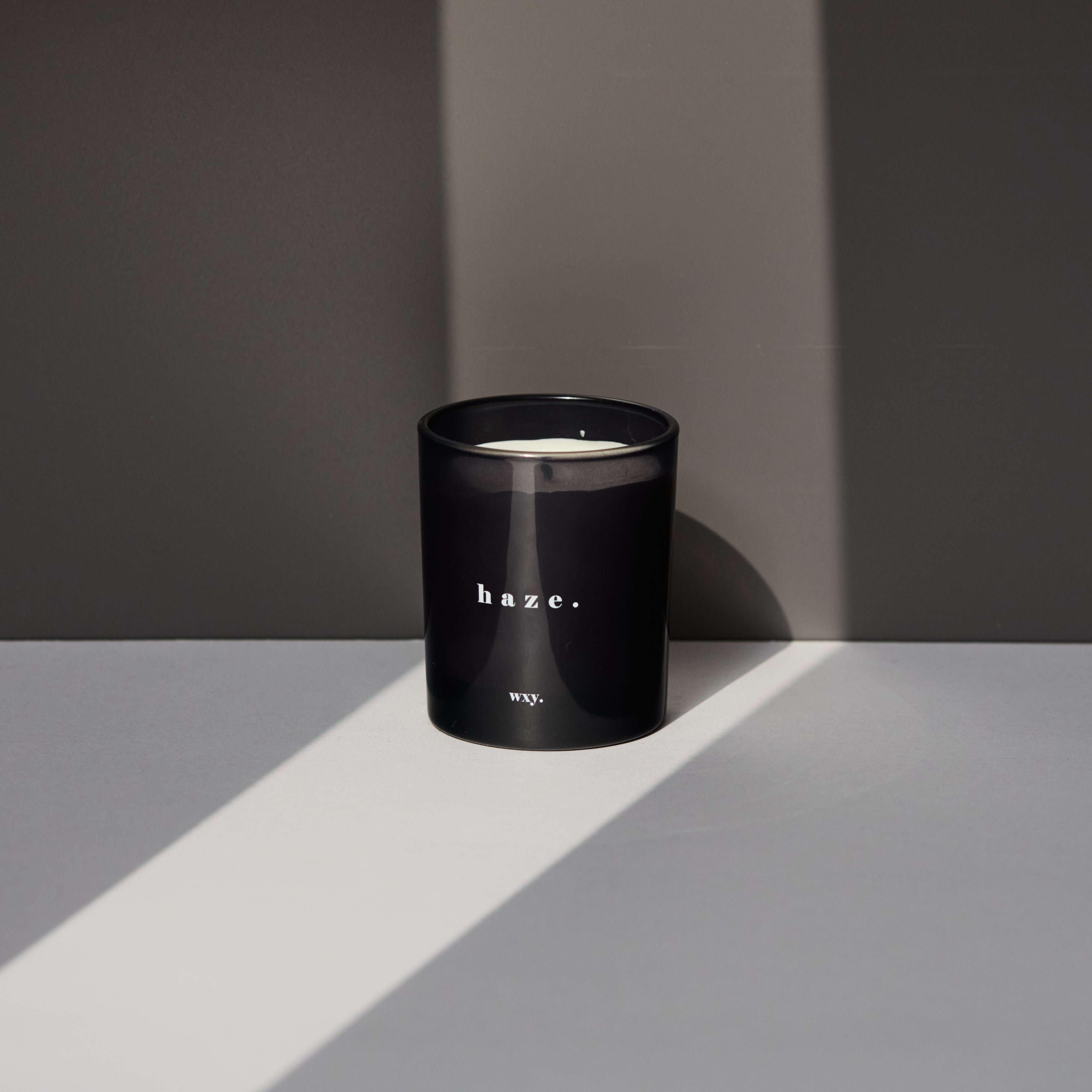 Haze Patchouli & Hemp Wxy Deluxe Candle by Sable Homeware, featuring a sleek white candle with earthy scent notes and modern design.