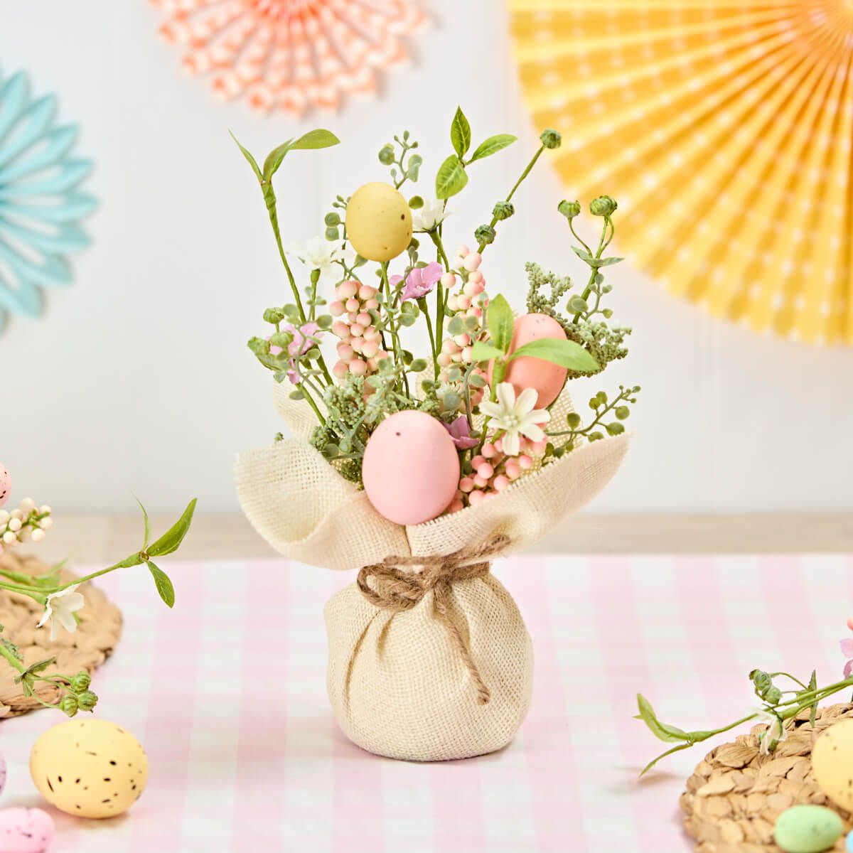 Artificial Easter egg ornament by Shabbyquins, decorative table centerpiece with pastel-colored eggs and floral accents.