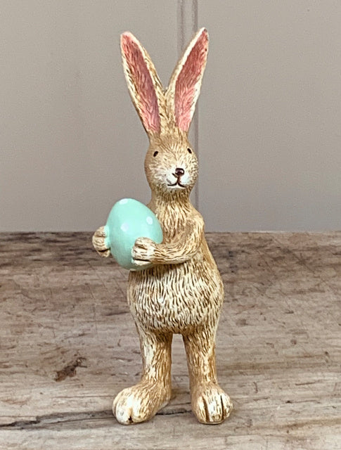 Shabbyquins Easter Bunny ornament with decorated eggs for spring holiday decor, featuring a cute bunny figure and colorful eggs.