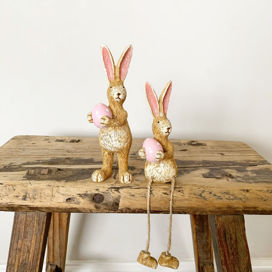 Shabbyquins Easter Bunny ornament with colorful eggs for spring holiday decoration, featuring a cute bunny figure with eggs.