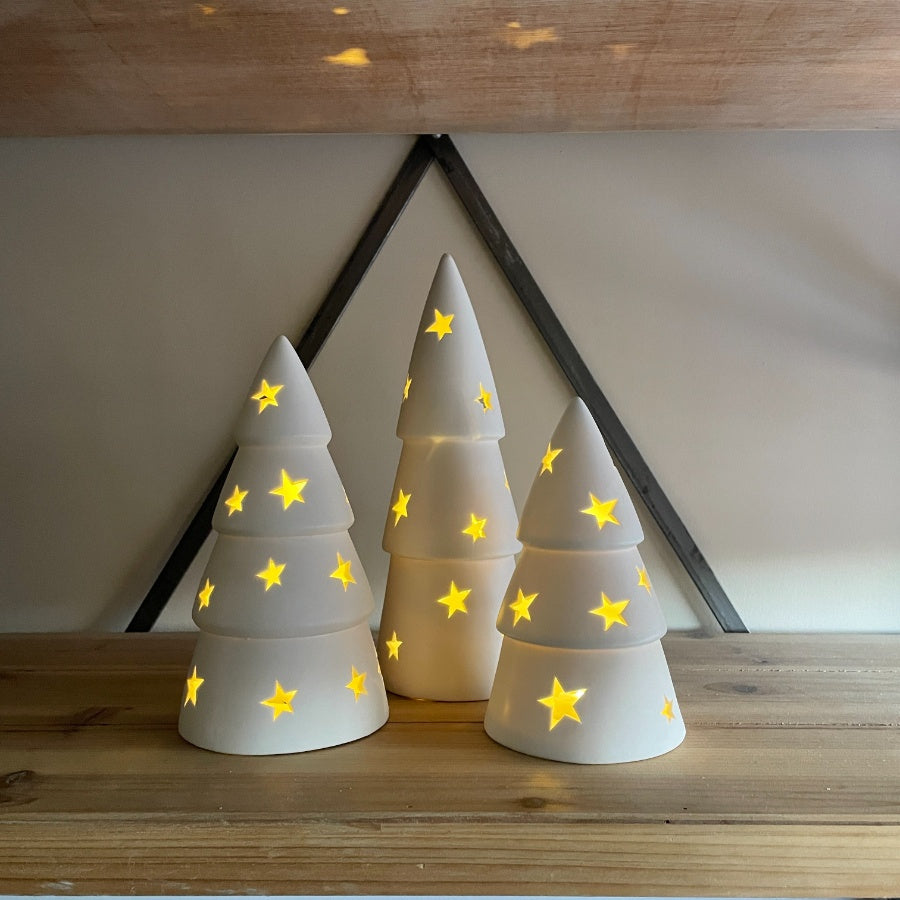 Set of 3 white light-up Christmas trees by Shabbyquins with festive illumination and decorative design.