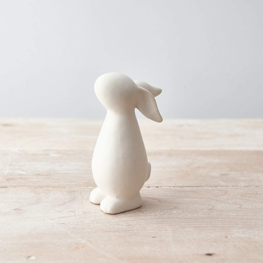 Set of 2 matte white Easter bunny ornaments with a smooth finish, perfect for spring holiday decor.