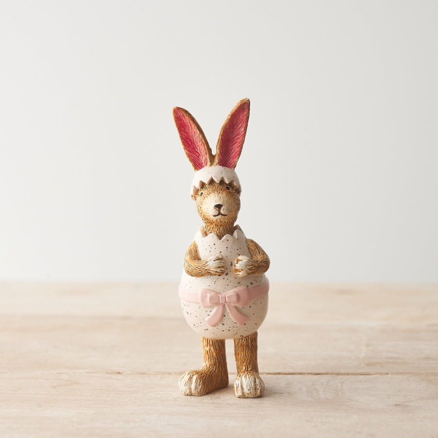 Shabbyquins resin rabbit ornament holding a speckled egg, decorative animal figurine for spring or Easter decor.