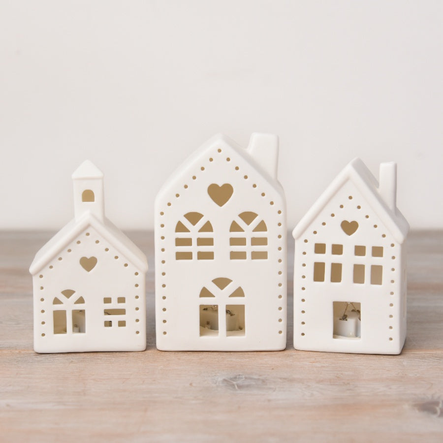Shabbyquins LED Village with three charming Chinese-inspired designs, illuminated miniature decorative village scene.