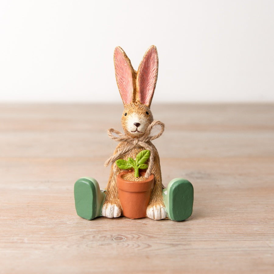 Set of two Shabbyquins gardening-themed bunny ornaments with detailed painted designs, perfect for outdoor or garden decor.