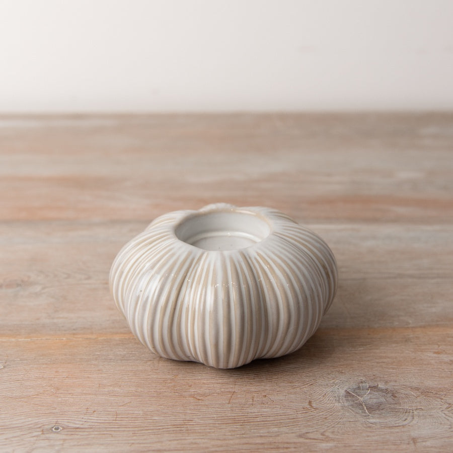 White pumpkin candle holder by Sable Homeware with a smooth finish, perfect for autumn decor or cozy table settings.