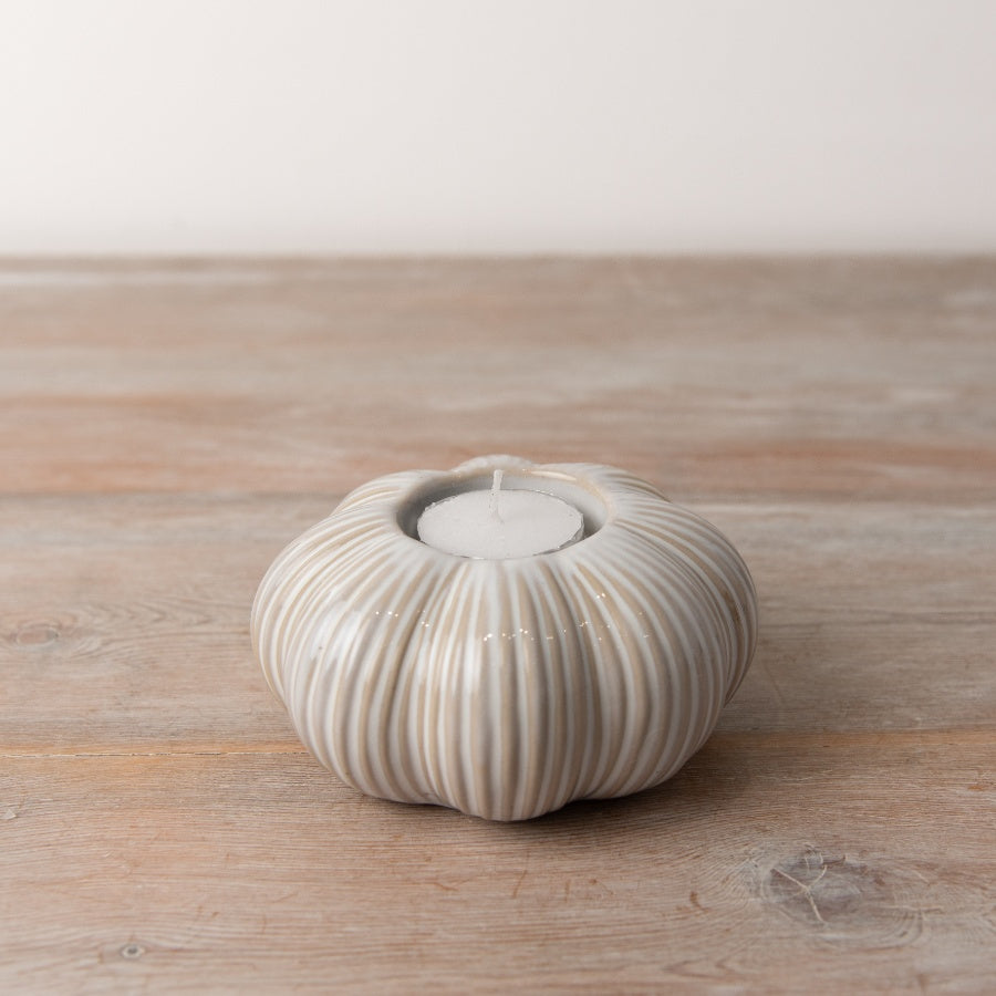 White pumpkin-shaped candle holder by Sable Homeware, decorative ceramic piece for fall and holiday home decor.