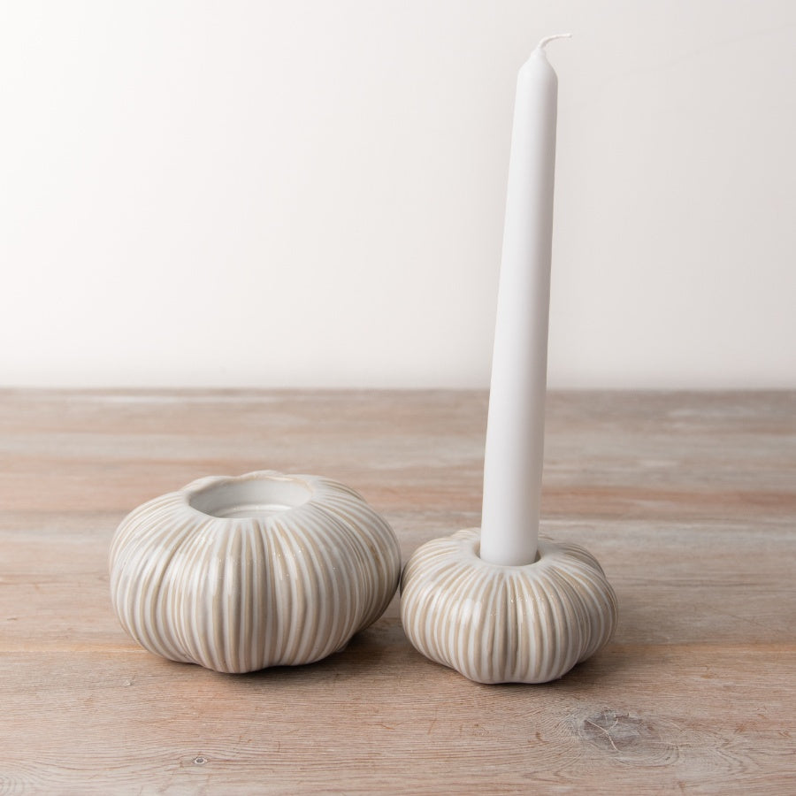 White pumpkin-shaped candle holder by Sable Homeware, decorative ceramic candle holder with carved pumpkin design.