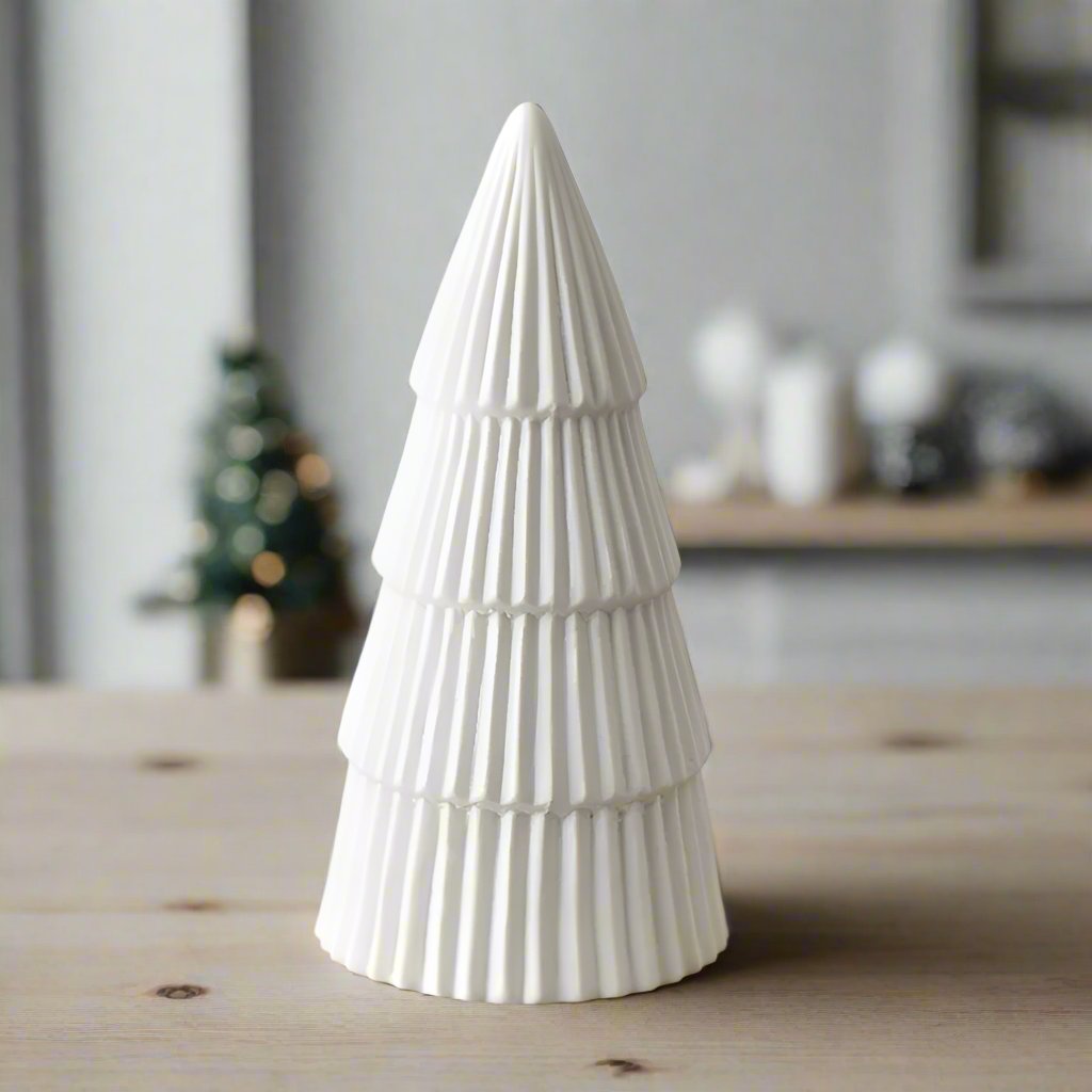 Set of three white glazed ceramic Christmas trees with a glossy finish, decorative holiday tree figures by Shabbyquins.