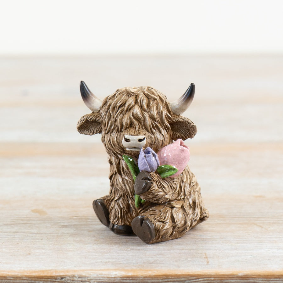 Shabbyquins Spring Highland Cow ornament featuring a detailed, realistic Highland cow figure with a rustic finish.