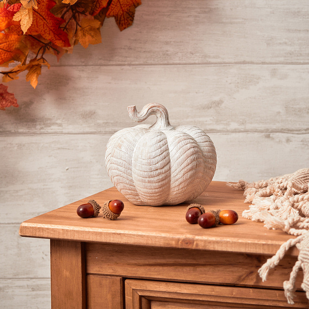 Natural carved pumpkin ornaments, set of 2, by Sable Homeware, featuring rustic, textured pumpkin designs for seasonal decor.