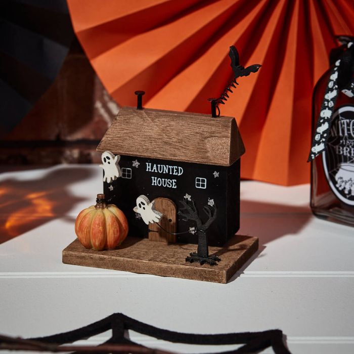Sable Homeware Halloween Haunted House ornament featuring a spooky haunted house with eerie details and orange accents.