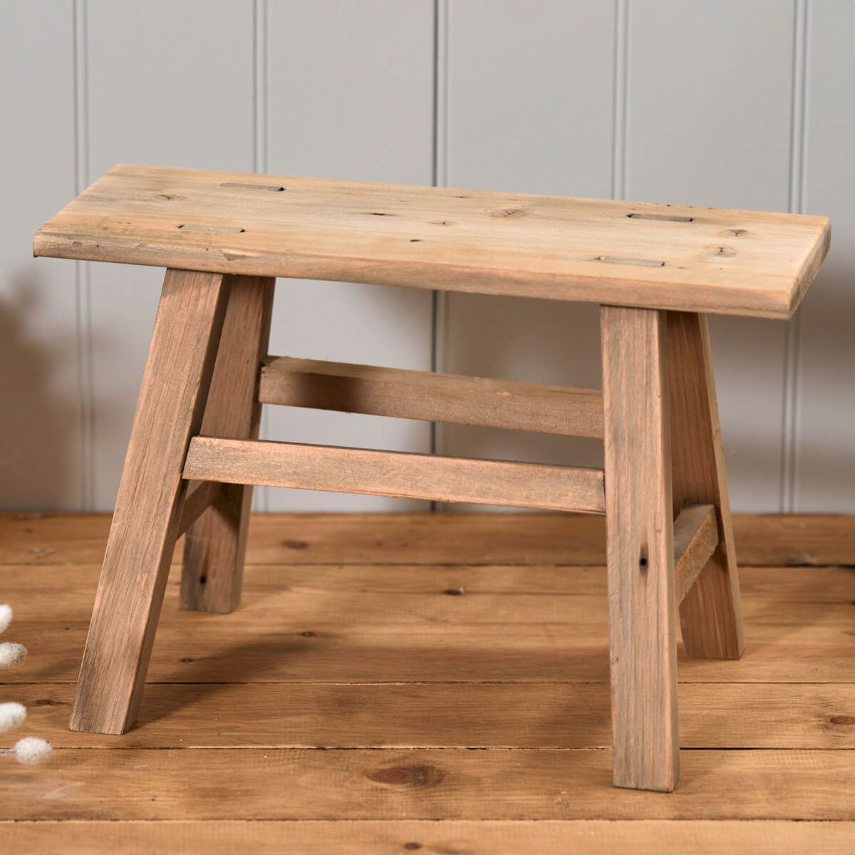 Recycled wood ornamental styling stool by Sable Homeware in two sizes, featuring natural wood grain and handcrafted design.