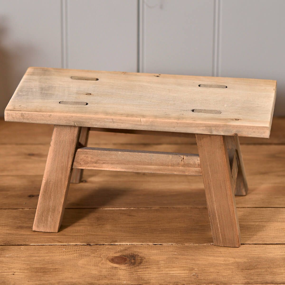 Recycled wood ornamental stool by Sable Homeware in two sizes, featuring a rustic design with natural wood finish.
