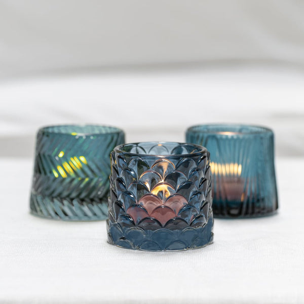 Set of three Pontus blue candle light holders by Sable Homeware, featuring elegant glass design for ambient decor.