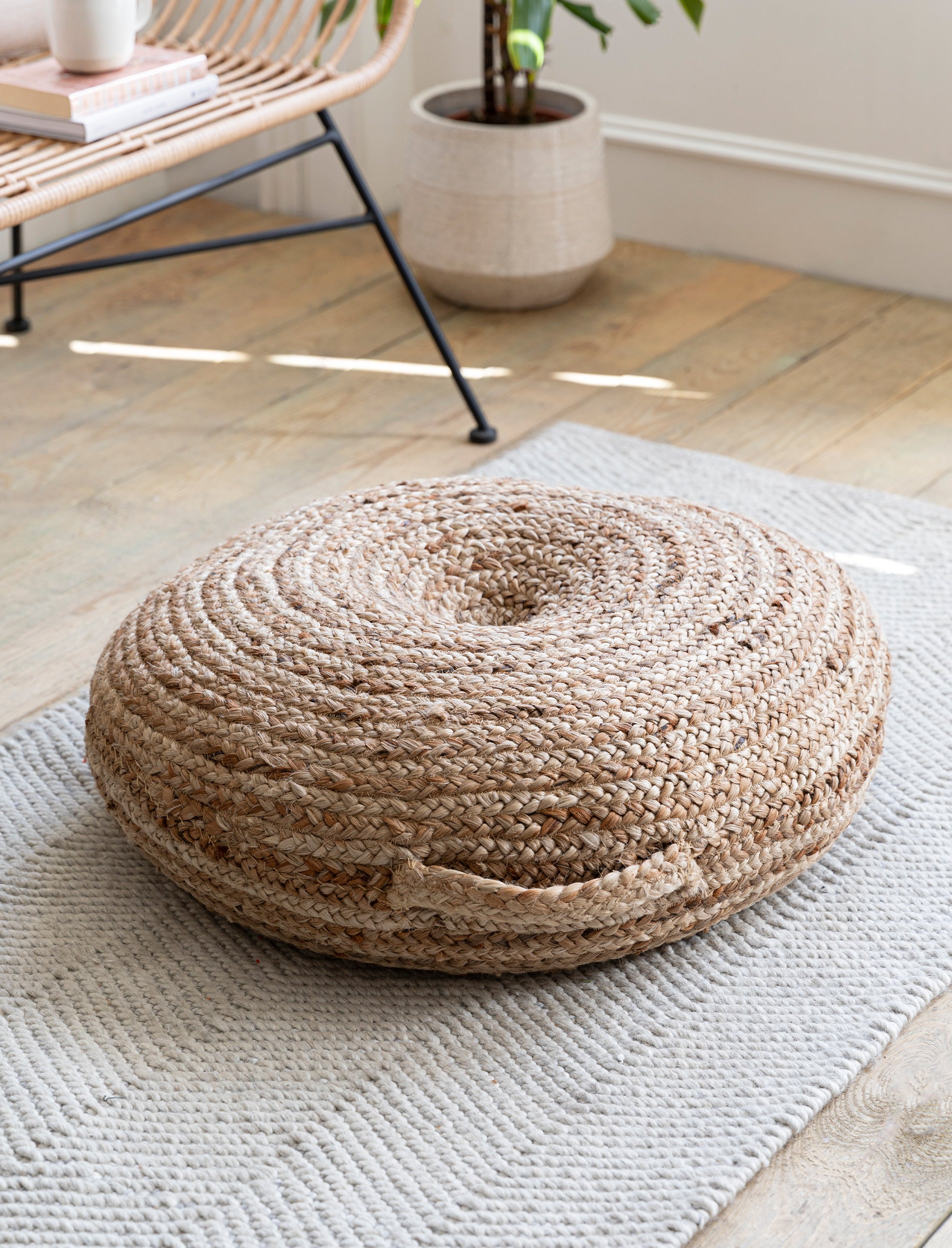 Natural jute floor cushion by Sable Homeware, featuring a woven texture and soft, neutral tones for comfortable seating.