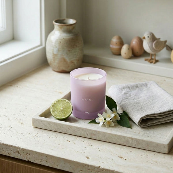 Sable Homeware Eos Orris Root and Amber deluxe candle with a warm, inviting glow and elegant floral fragrance.