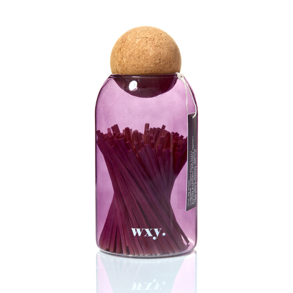 Deep purple luxury matches in a cork stopper jar by Sable Homeware, stylishly displayed for home decor or lighting needs.