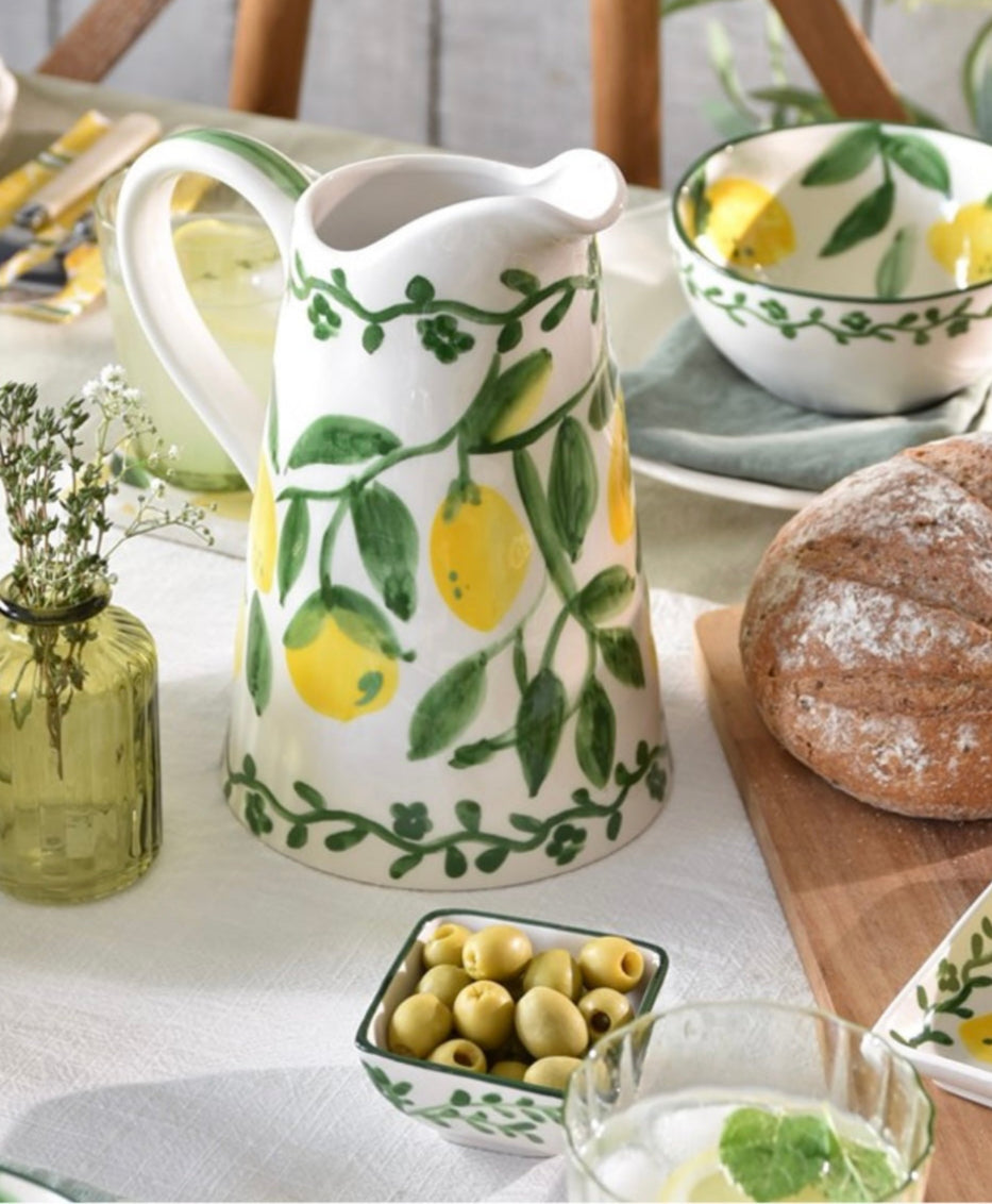 Sable Homeware artisan lemon stoneware pitcher jug with a smooth, rounded design and textured surface, perfect for serving beverages.