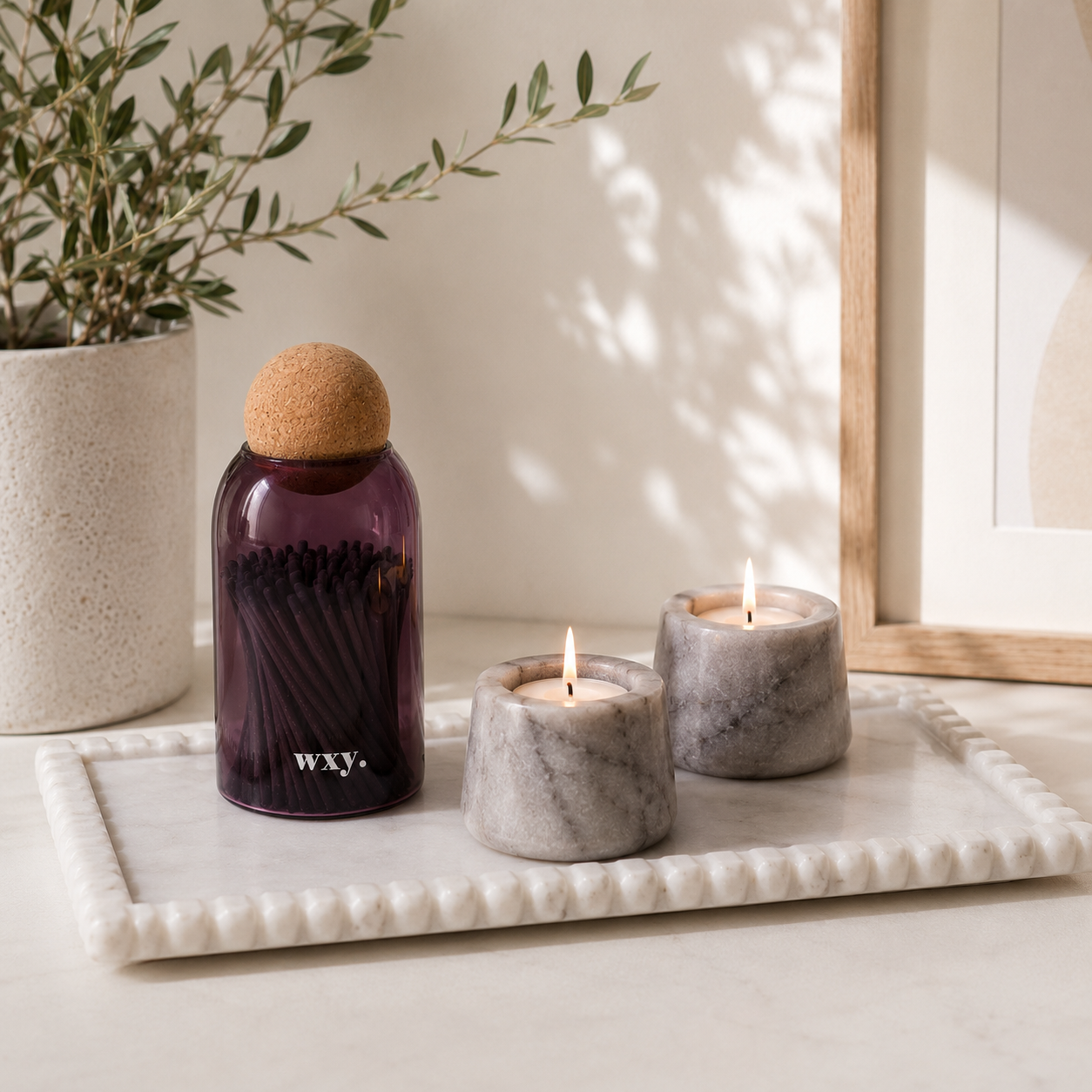 The Golden Hour Set — Makrana marble tray, Osney tealight holders and cork jar matches styled together in evening light