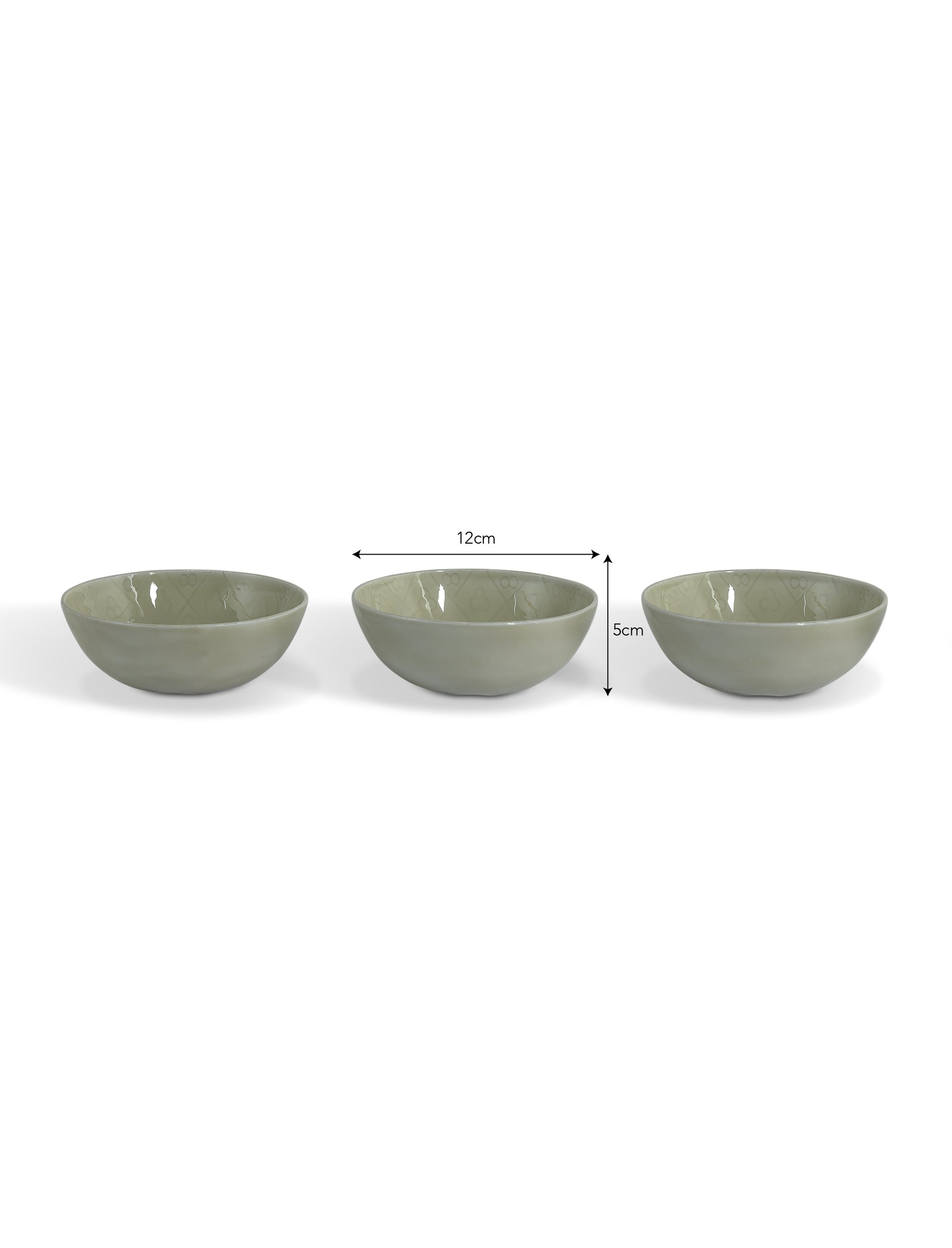 Set of three Fiskardo Nibble Bowls by Sable Homeware in clay, showcasing small, handcrafted bowls with a smooth finish.