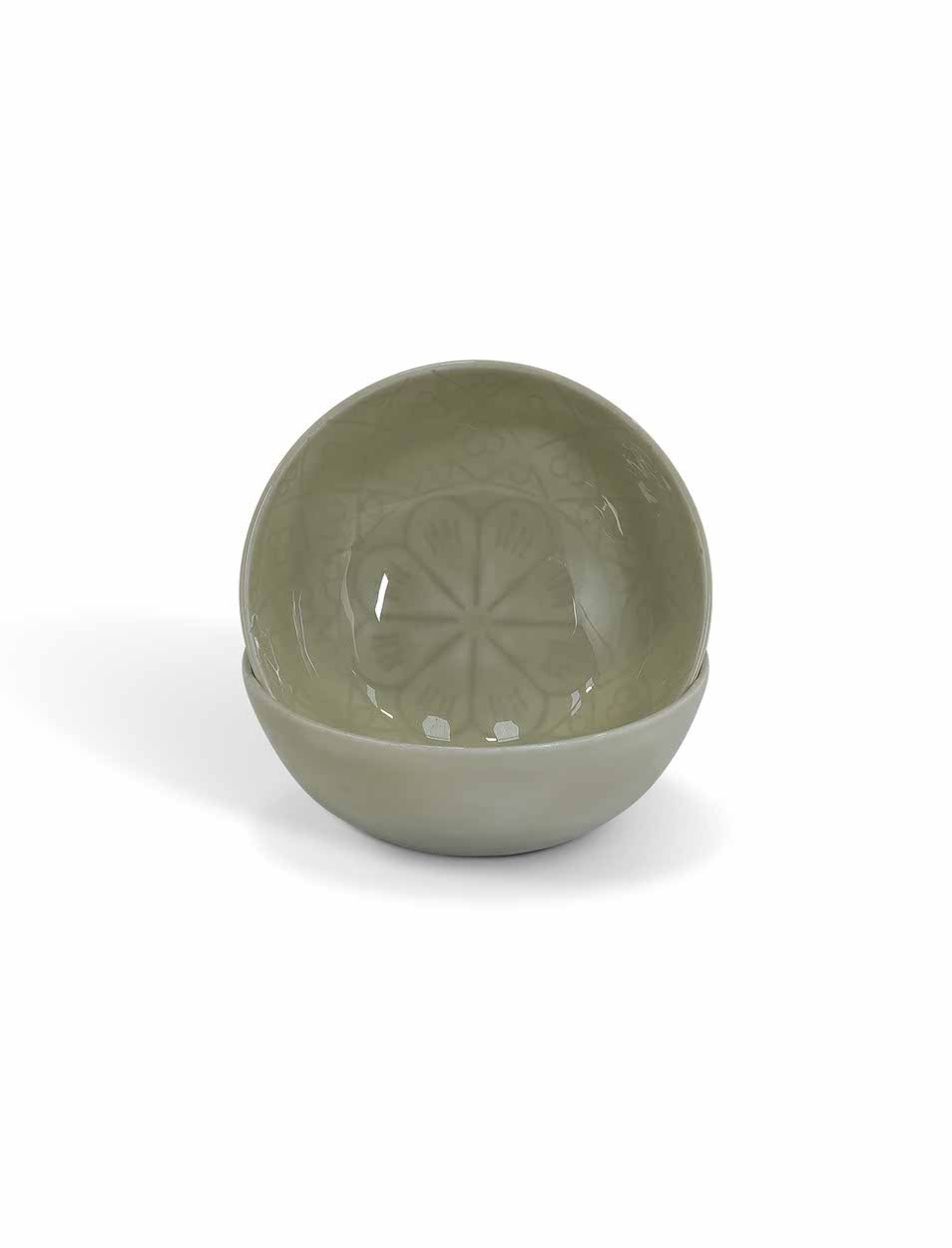 Set of three Fiskardo Nibble Bowls by Sable Homeware in clay, showcasing their round shape and textured surface.