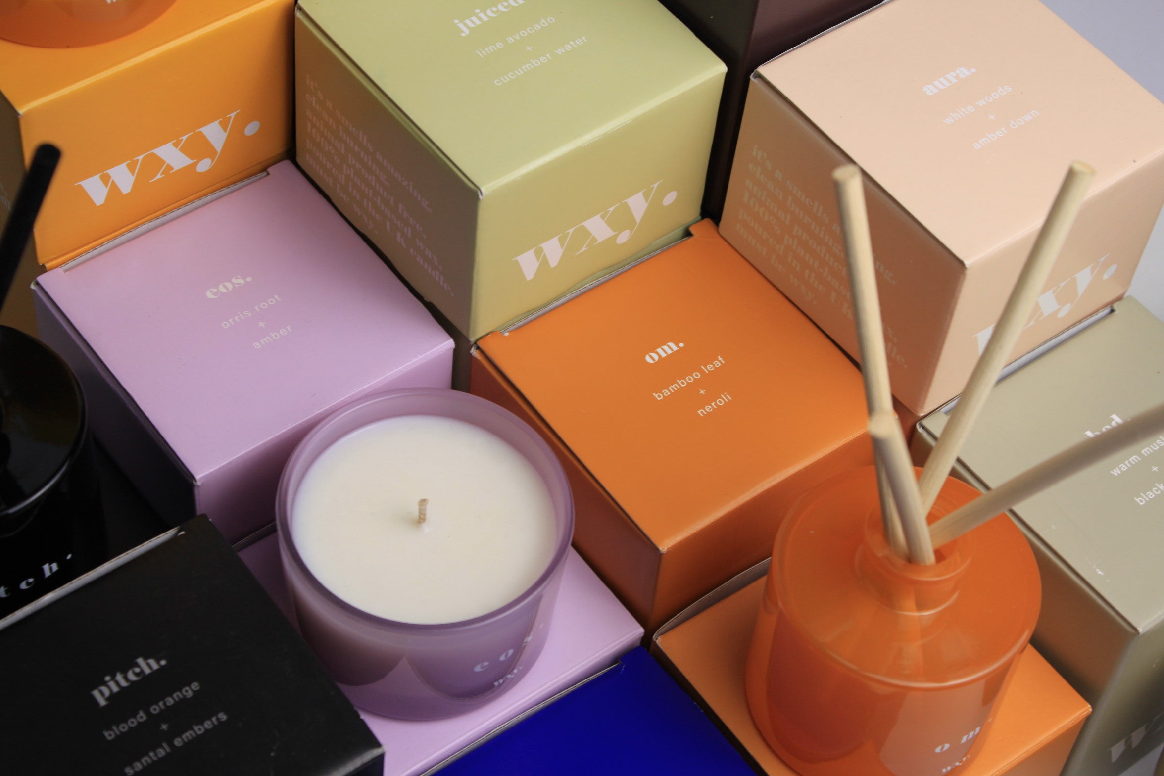Sable Homeware Om Bamboo Leaf and Neroli candle in a decorative candle holder, showcasing a luxurious and elegant ambiance.