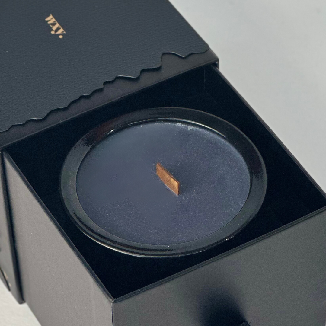 Sable Homeware Wxy Luxury Umbra Candle and Room Spray in an elegant candle holder with a sleek, modern design.