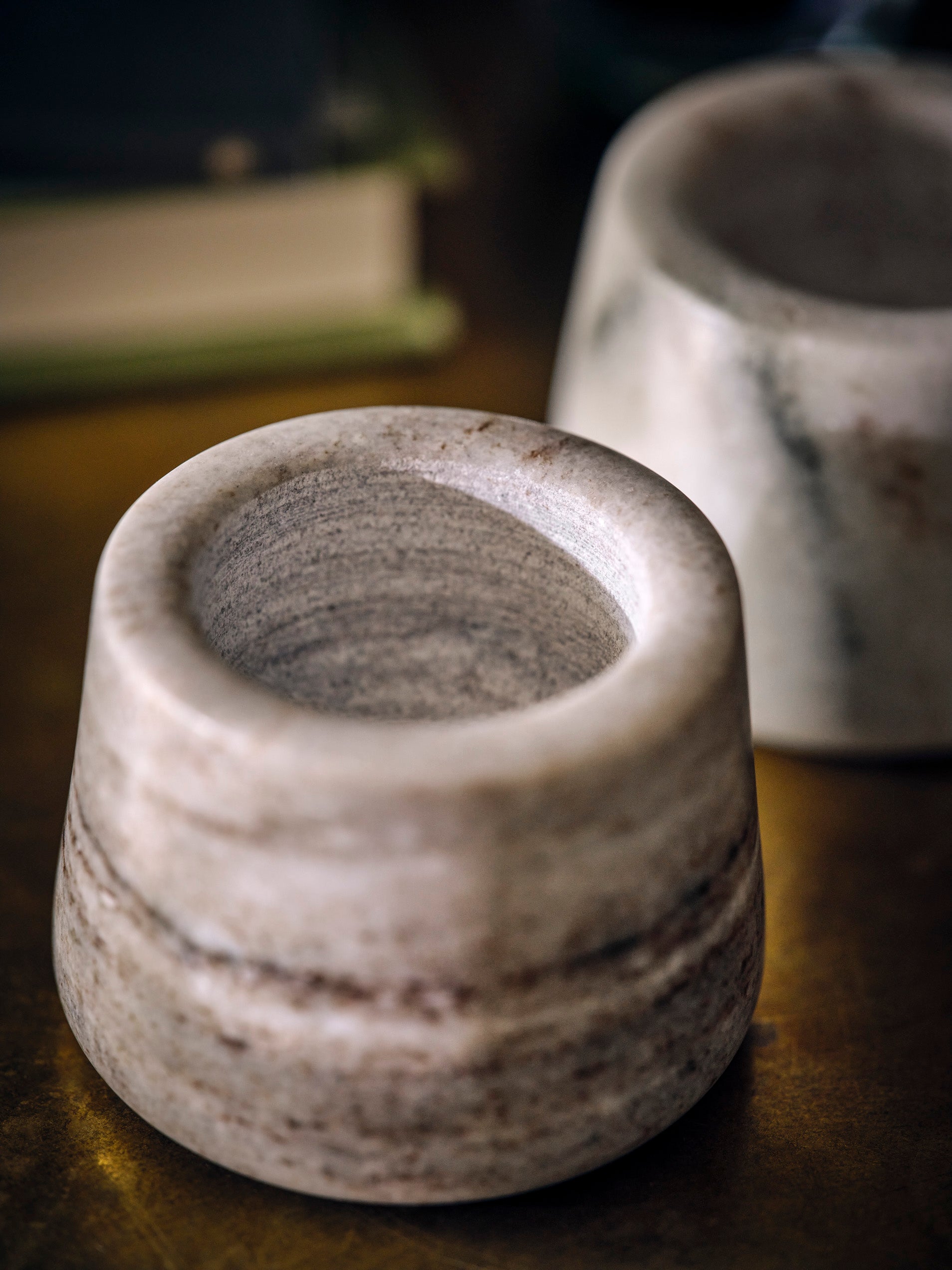 Set of two Osney marble tealight holders by Sable Homeware, natural marble with smooth, polished surface for candle display.