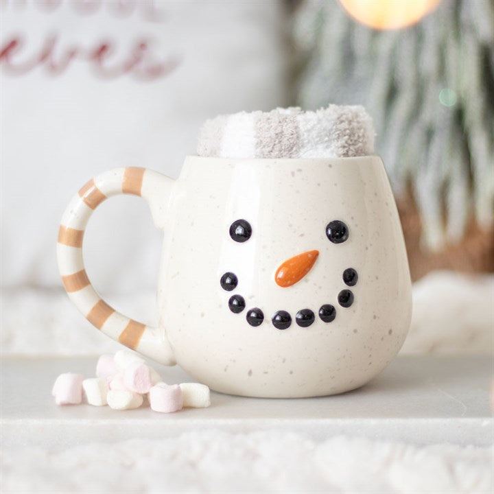 Shabbyquins mug and socks gift set featuring three cute designs, including a cozy mug and matching socks with playful patterns.
