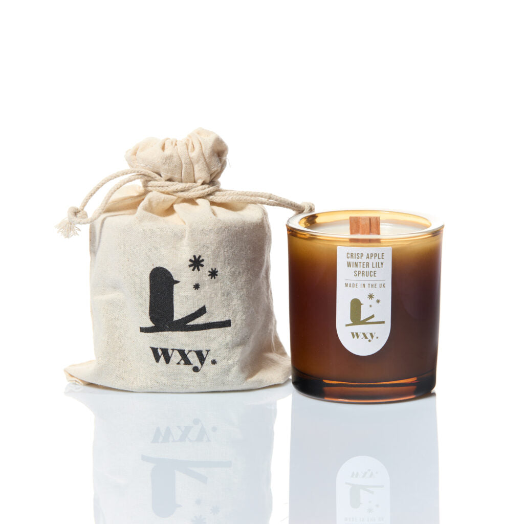 Sable Homeware luxury amber Christmas candle in a decorative candle holder, perfect for festive holiday decor.