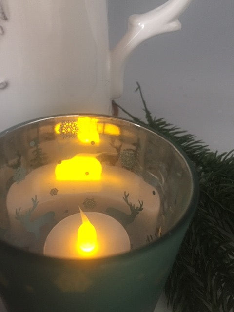 Woodland-themed Sable Homeware Christmas tealight candle holder with forest design, perfect for holiday decor.