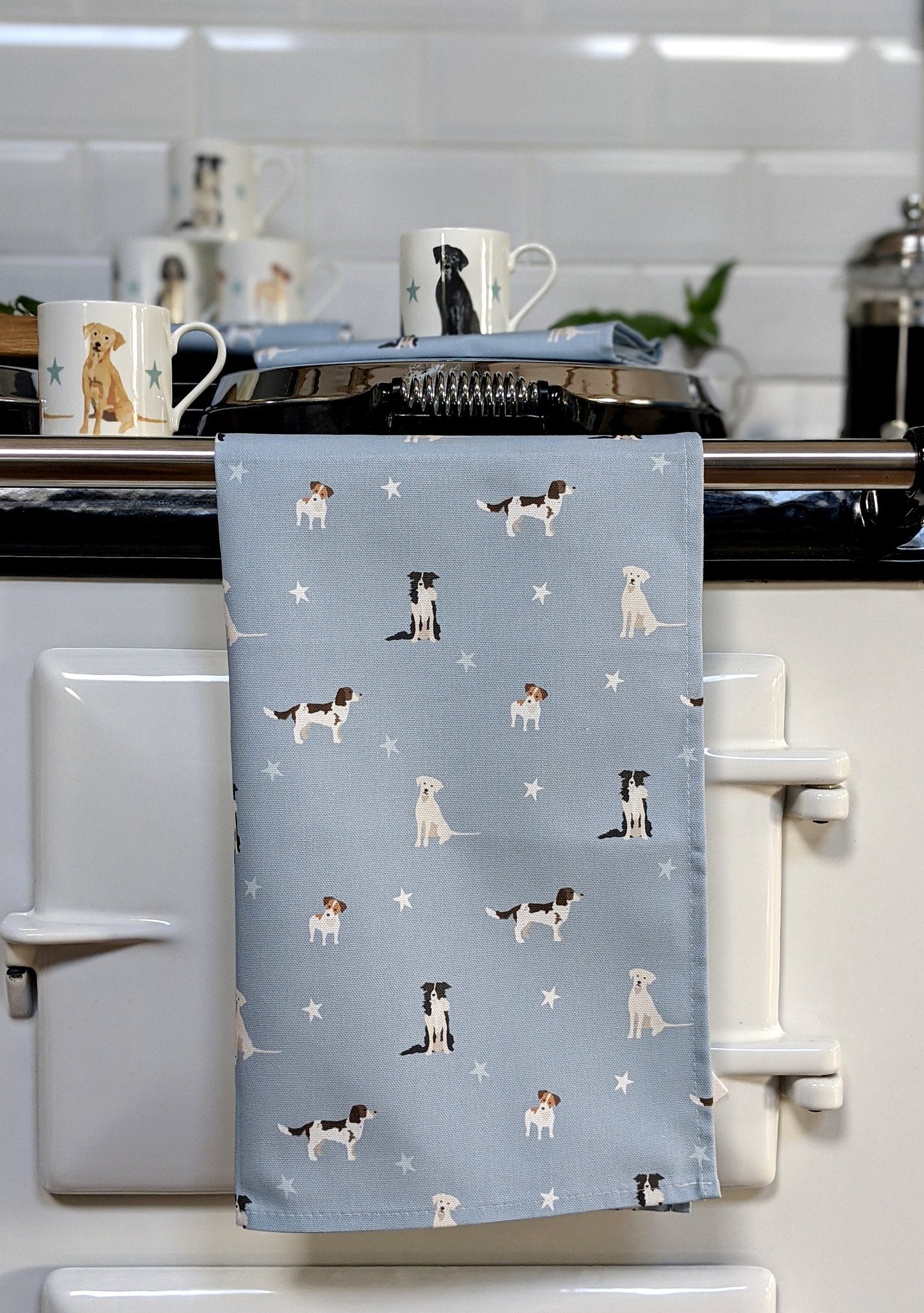 Shabbyquins Rebecca Pitcher Tea Towel featuring a playful dog design in vibrant colors, perfect for home decor.