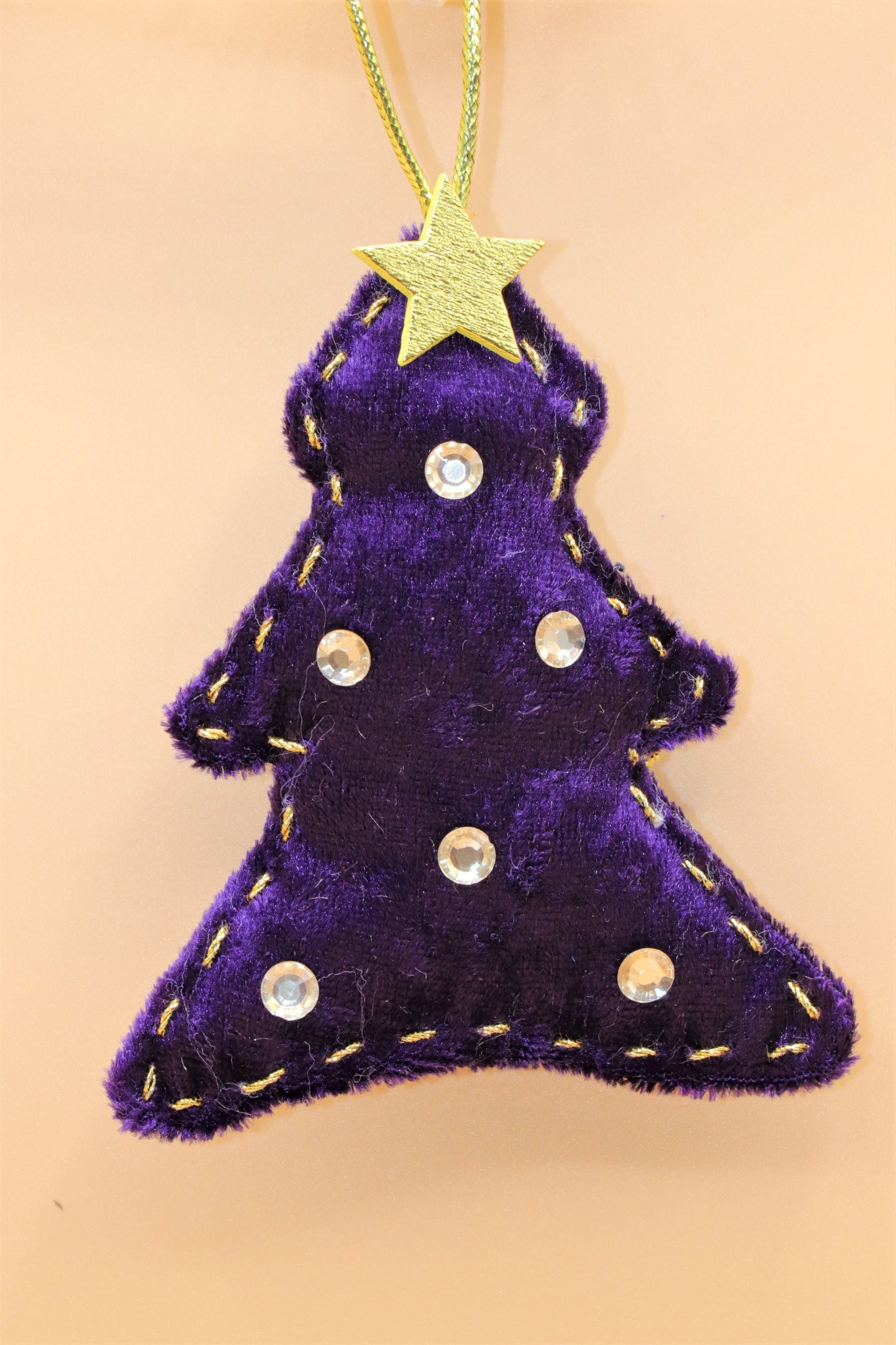Handmade Christmas tree ornaments by Sable Homeware, featuring festive designs and intricate details for holiday decorating.