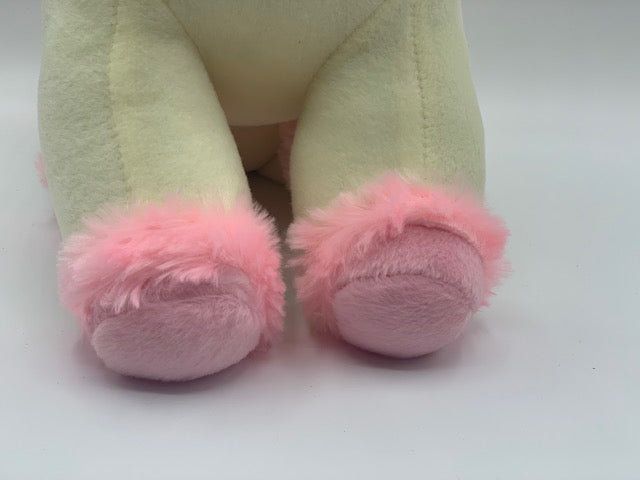 Sable Homeware unicorn door stop in the shape of a colorful unicorn figure holding a door open.
