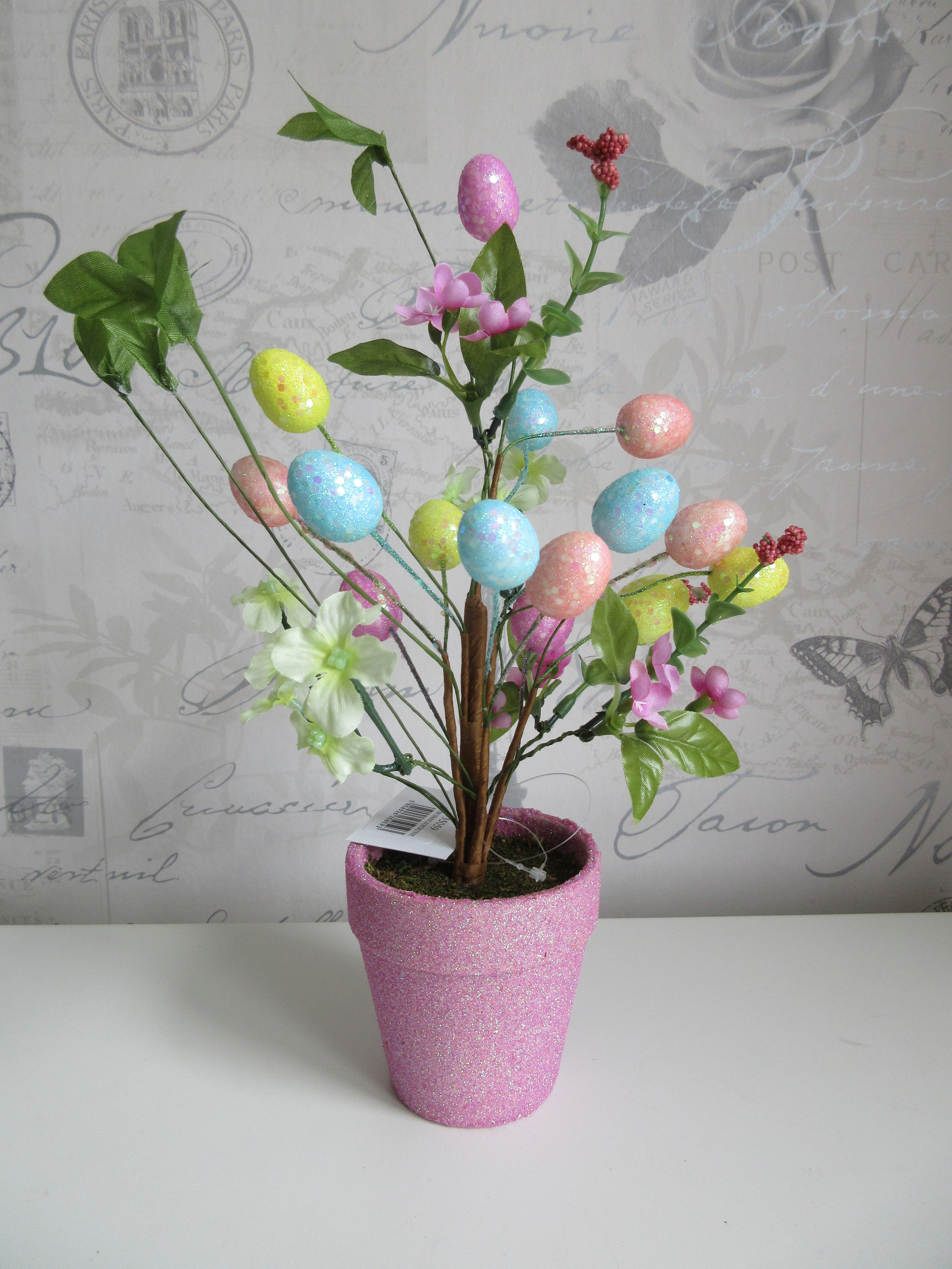 Shabbyquins Easter Sparkle Tree with colorful decorative ornaments and shimmering details, perfect for spring holiday decor.