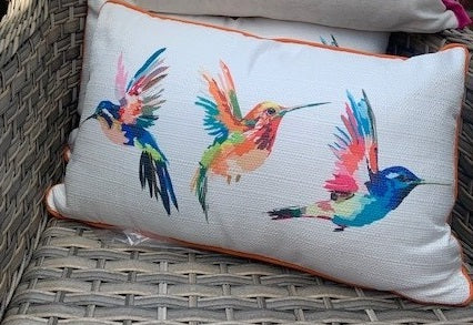Rectangular cushion featuring hummingbird and butterfly designs by Sable Homeware, with vibrant floral patterns and soft fabric.