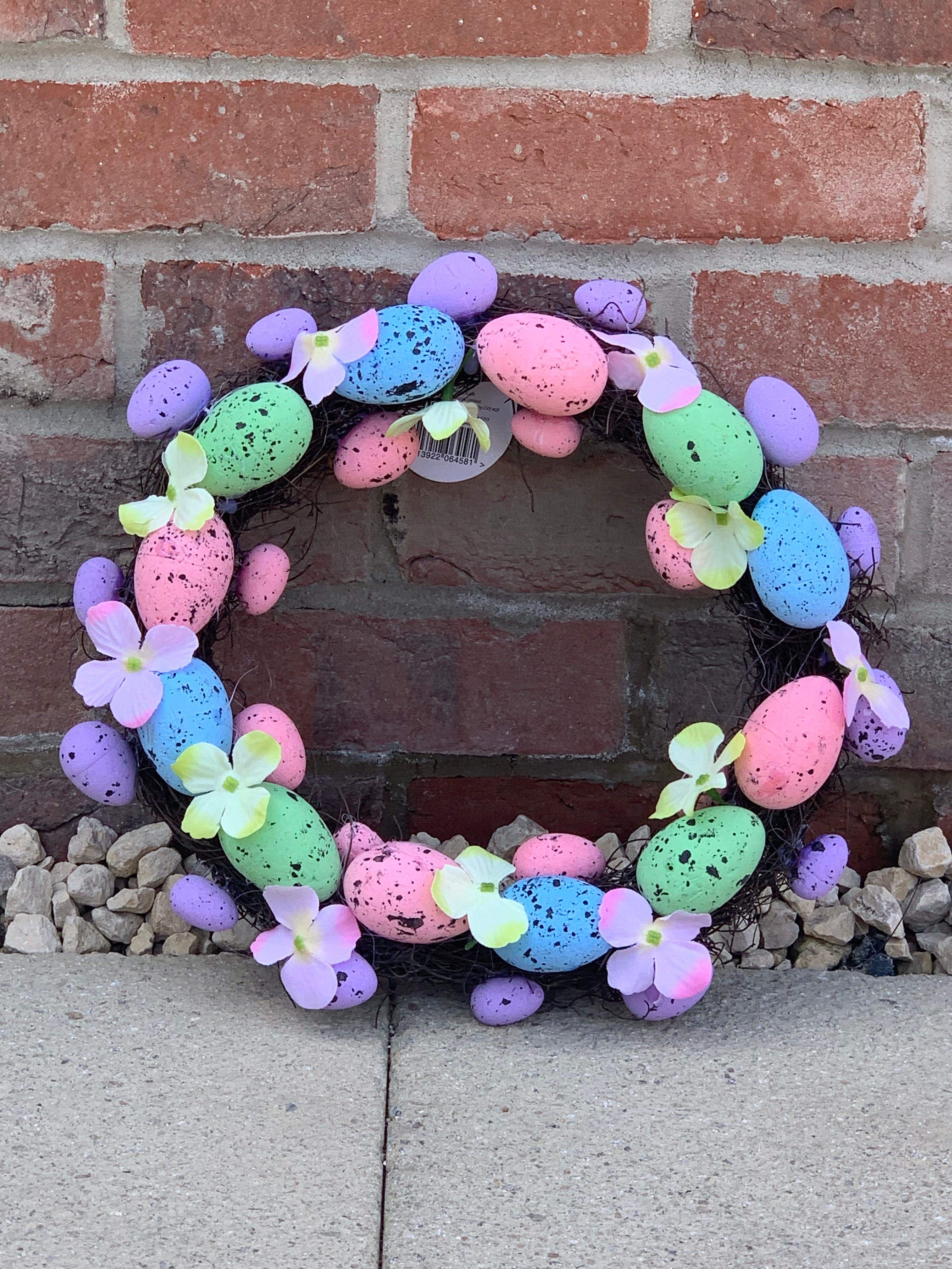 Spring Brights Easter wreath by Shabbyquins featuring colorful flowers, pastel accents, and festive spring decorations.